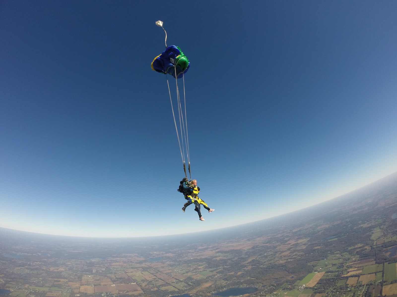 VIDEO: Premature Parachute Opening Rips Skydive Student From Plane